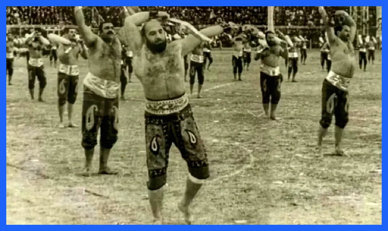  نورمن ویزدوم و همسرش در کنار «شعبان بی‌مخ» در تهران؛ سال ۱۳۴۸ (عکس)