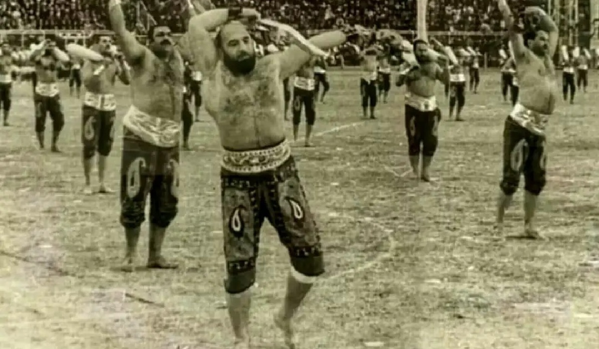  نورمن ویزدوم و همسرش در کنار «شعبان بی‌مخ» در تهران؛ سال ۱۳۴۸ (عکس)